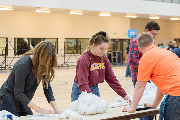 Students are assembling hygiene kits, braiding jump ropes and making plarn for plastic sleep mats.