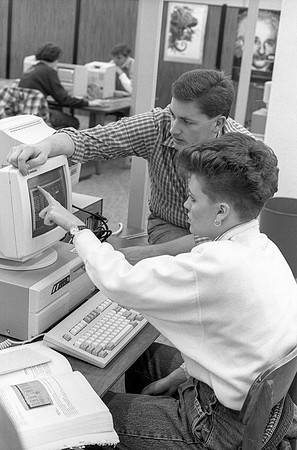 Students work in the Computer Lab on campus. November 1990.