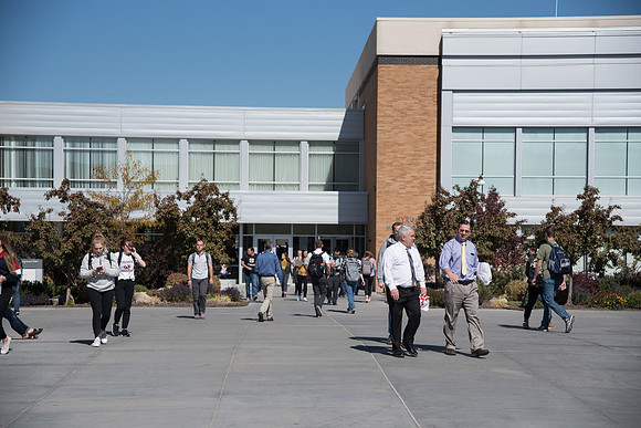 Students walking around between classes on a campus Friday.