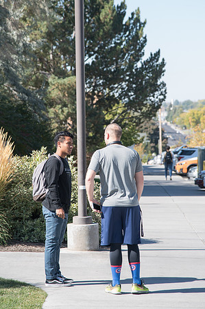 Students walking around between classes on a campus Friday.