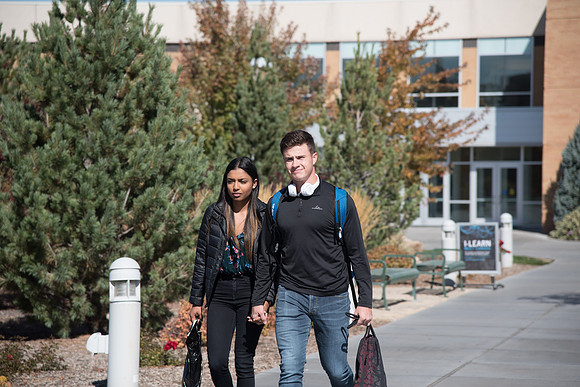 Students walking around between classes on a campus Friday.
