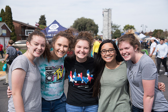 Students and members of the community gather to support local businesses, win prizes, and have fun.