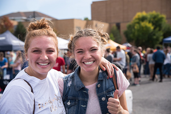 Students and members of the community gather to support local businesses, win prizes, and have fun.