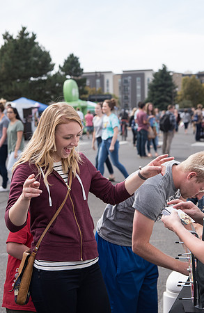 Students and members of the community gather to support local businesses, win prizes, and have fun.