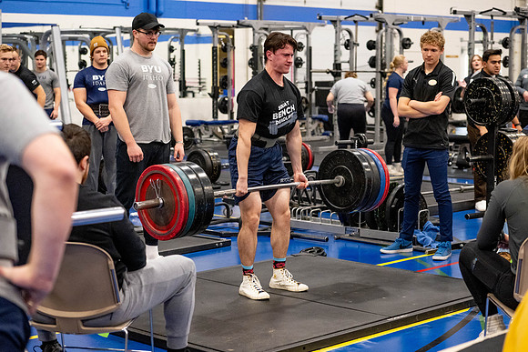 Students compete in Squat Bench and Deadlift challenges. In the BYU-Idaho gym in the Hart Building.