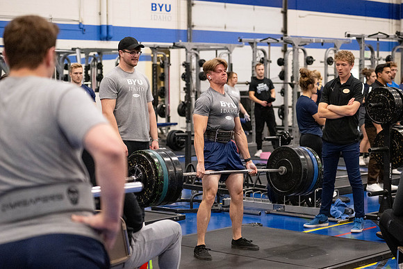 Students compete in Squat Bench and Deadlift challenges. In the BYU-Idaho gym in the Hart Building.
