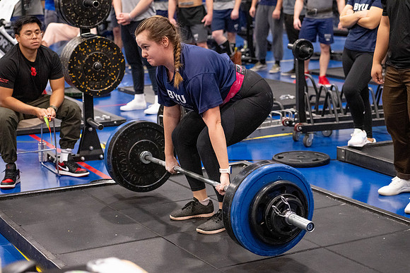 Students compete in Squat Bench and Deadlift challenges. In the BYU-Idaho gym in the Hart Building.
