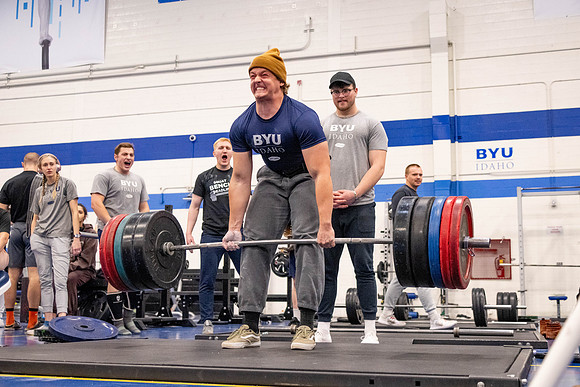 Students compete in Squat Bench and Deadlift challenges. In the BYU-Idaho gym in the Hart Building.