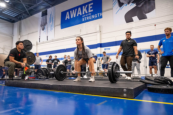 Students compete in Squat Bench and Deadlift challenges. In the BYU-Idaho gym in the Hart Building.