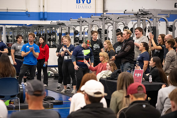 Students compete in Squat Bench and Deadlift challenges. In the BYU-Idaho gym in the Hart Building.