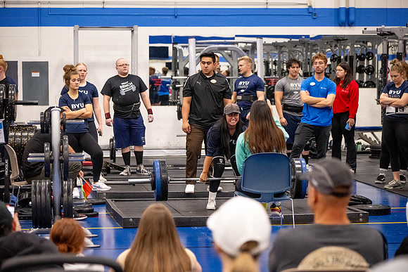 Students compete in Squat Bench and Deadlift challenges. In the BYU-Idaho gym in the Hart Building.