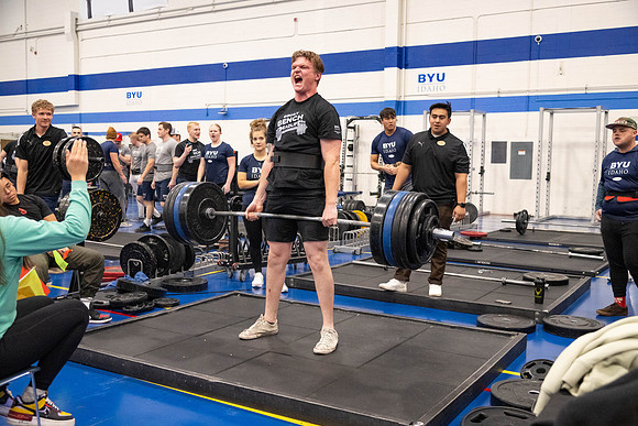 Students compete in Squat Bench and Deadlift challenges. In the BYU-Idaho gym in the Hart Building.