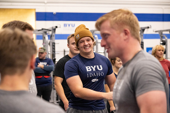 Students compete in Squat Bench and Deadlift challenges. In the BYU-Idaho gym in the Hart Building.