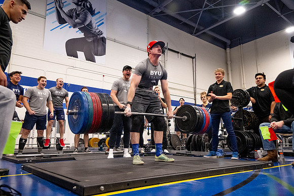 Students compete in Squat Bench and Deadlift challenges. In the BYU-Idaho gym in the Hart Building.