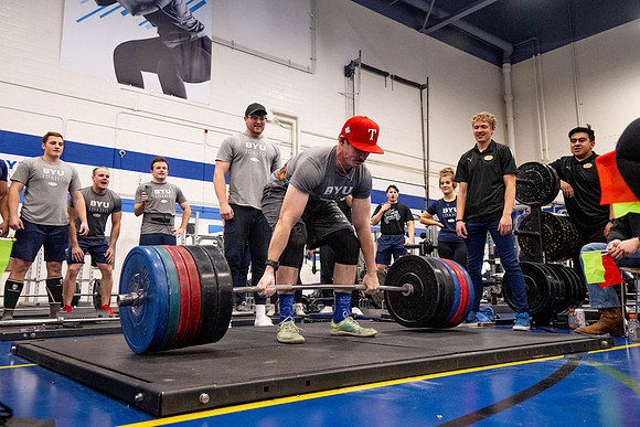 Students compete in Squat Bench and Deadlift challenges. In the BYU-Idaho gym in the Hart Building.