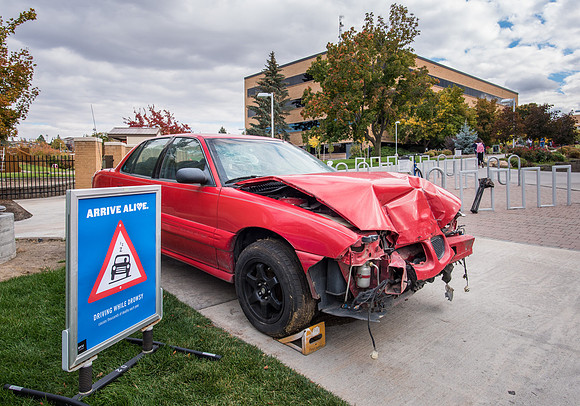 Drive Safe campaign. Wrecked car on BYU-Idaho campus reminding students to drive safe.