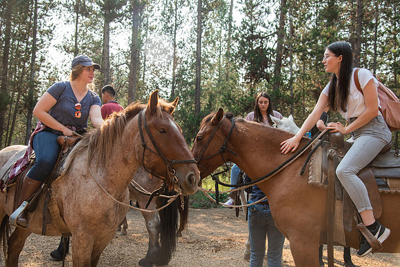 BYUI students go horseback riding at Harriman State Park in the summer of 2021.