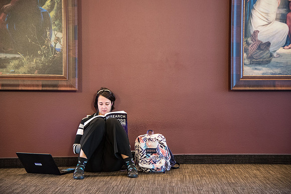 Student studying in the I-Center in the middle of the day. Oct 2018