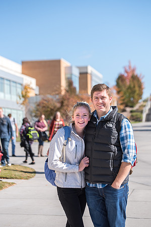 Married students walking through campus together. Oct 2018