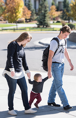 Married students walking through campus together. Oct 2018