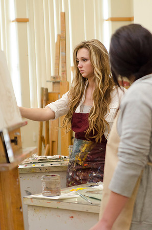 David Belka enthusiatically teaches painting principles to beginning painting class.