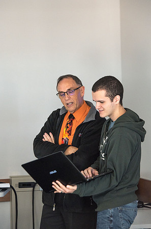 Brother Blaine Robinson teaches his students how to decide on and control the details on any webpage.