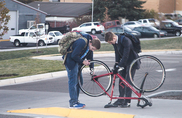 Students helping each other out on an early morning on campus.