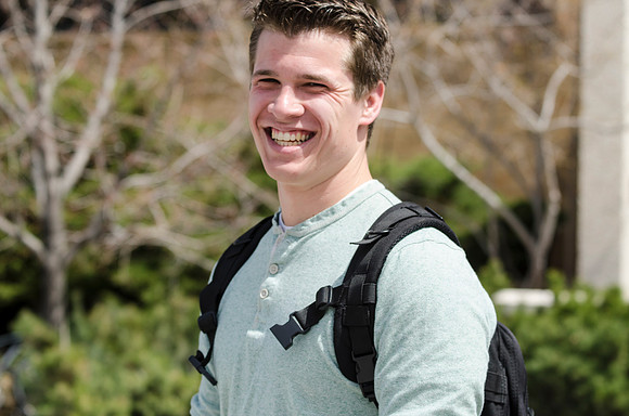 A student smiles for the camera.