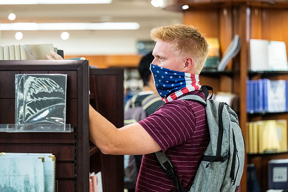 Students on campus on the first day of school, Fall Semester.