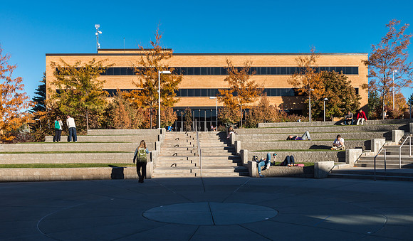 Students relaxing in the Central Quad on a warm Autumn Day.