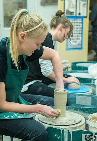 Jenna Ray working on her ceramics project.