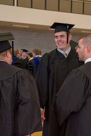 Students await commencement ceremony held in the BYU-Idaho Center.