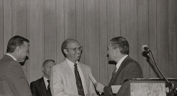 President Bennion presents exemplary faculty award
