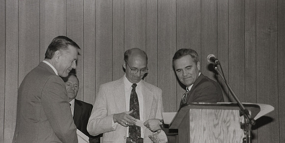 President Bennion presents exemplary faculty award