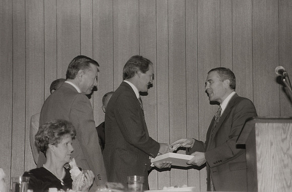 President Bennion presents exemplary faculty award