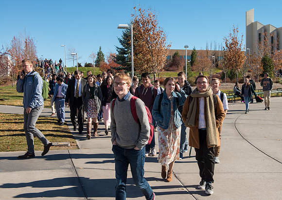 Students gather in the BYU-Idaho Center for a devotional with President Dallin Oaks.