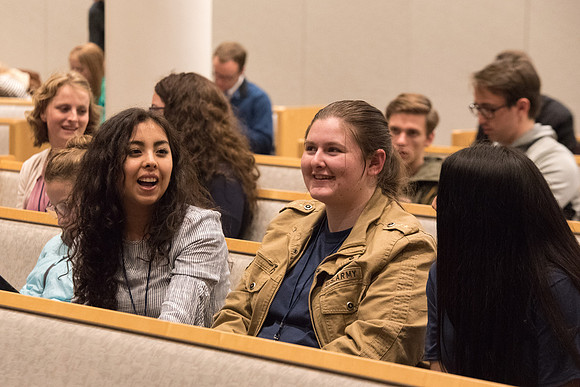 Students mingling before the keynote speaking.