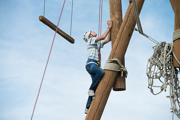 Youth high enjoy the Ropes Course class.