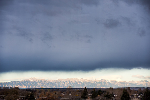 View of the mountains beneath storm clouds.