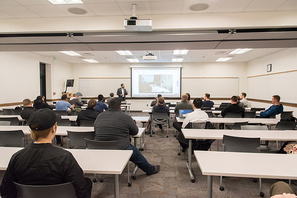 Patrick Vera, employee from Bloomberg company, gave a presentation about this company for students who are interesting in working at there.
