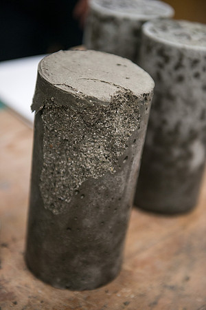 Civil engineering students work with different mixtures of cement to make a light, yet durable, cement that will be the building material for a canoe.