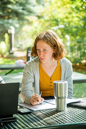 Students studying in the Ricks gardens.