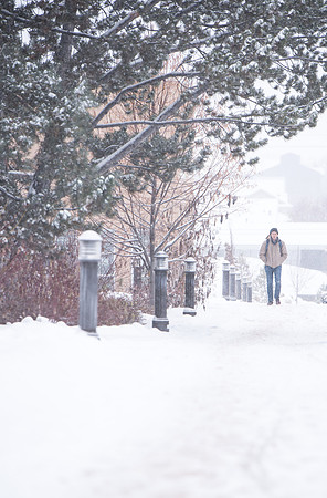 Students make their way through the snow to get to class. December 2018