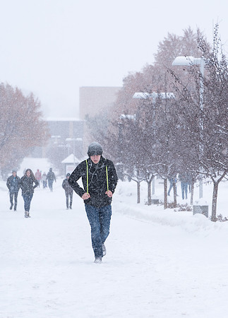 Scenes and students on campus on a snowy morning.