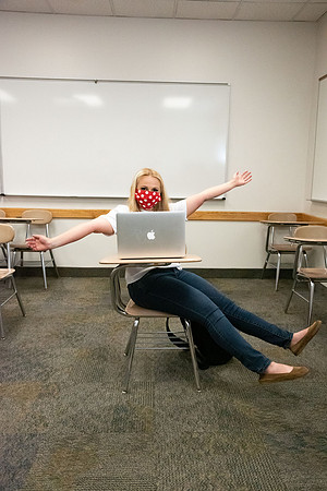 Examples of students staying safe and healthy during the COVID-19 pandemic by social distancing, following pathway arrows, and wearing face masks.