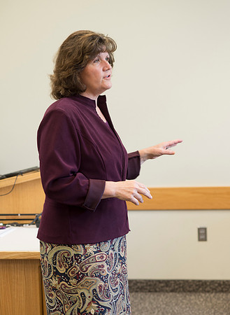 Sister Brooke McKenna teaches students in a communication class.