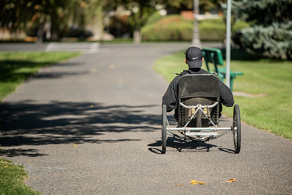 A BYUI therapeutic recreation class rides adaptive bicycles in Porter park during the fall 2021 semester.