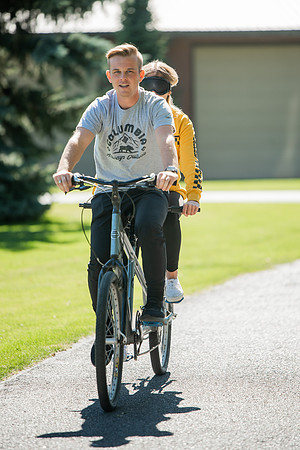 A BYUI therapeutic recreation class rides adaptive bicycles in Porter park during the fall 2021 semester.