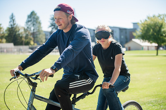 A BYUI therapeutic recreation class rides adaptive bicycles in Porter park during the fall 2021 semester.