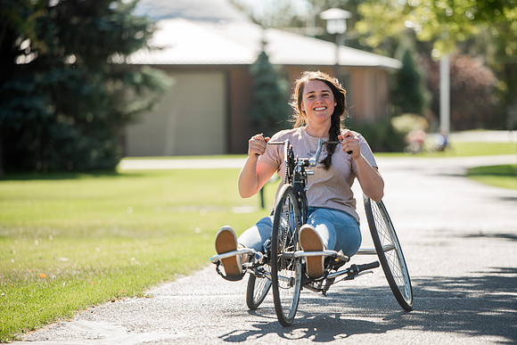 A BYUI therapeutic recreation class rides adaptive bicycles in Porter park during the fall 2021 semester.
